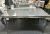 1.5 Grey glass louis dining table with x4 Grey velvet lion knocker chairs